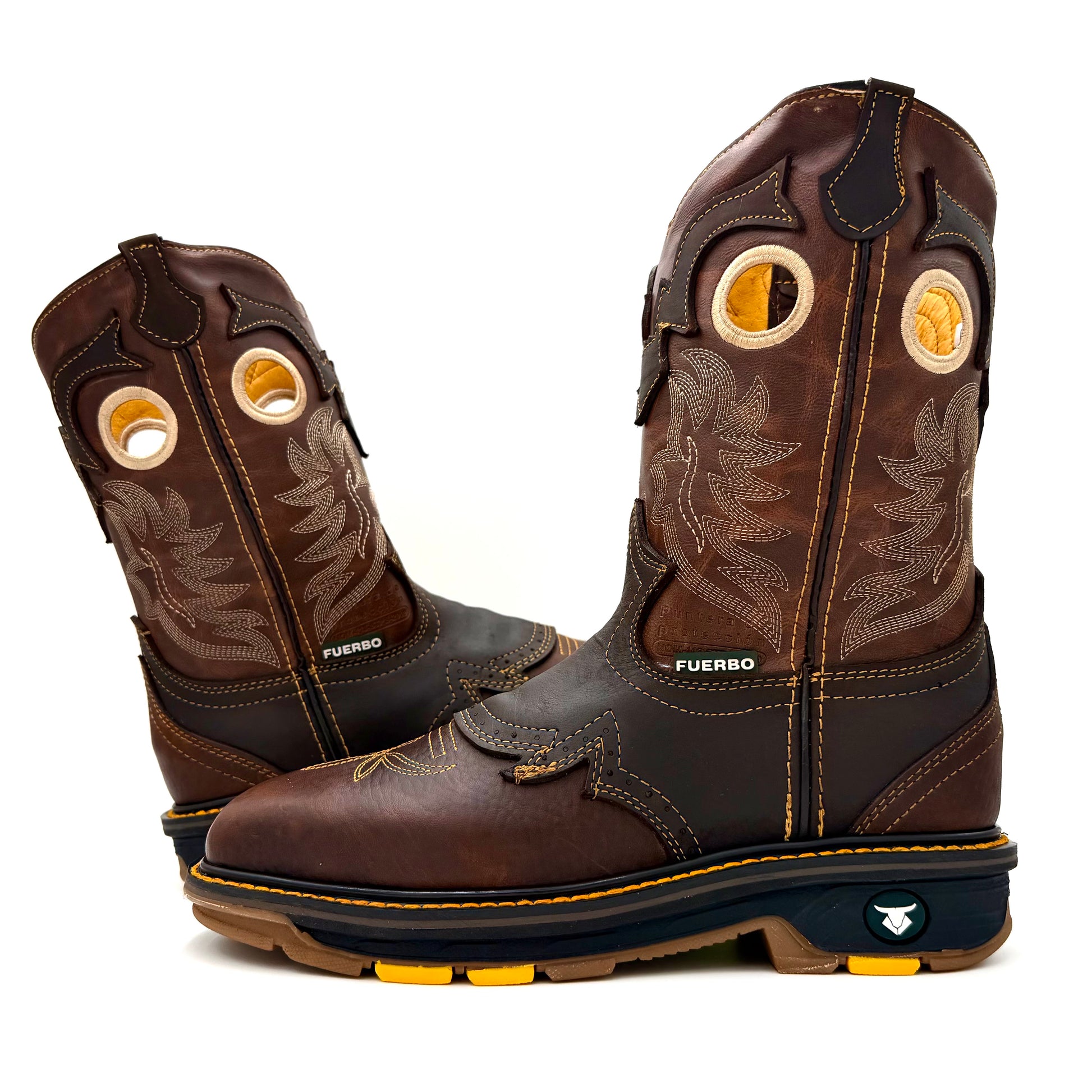 Pair of brown leather Fuerbo square-toe rodeo work boots with western stitching, dark reinforcements, and rugged brown-and-yellow soles.