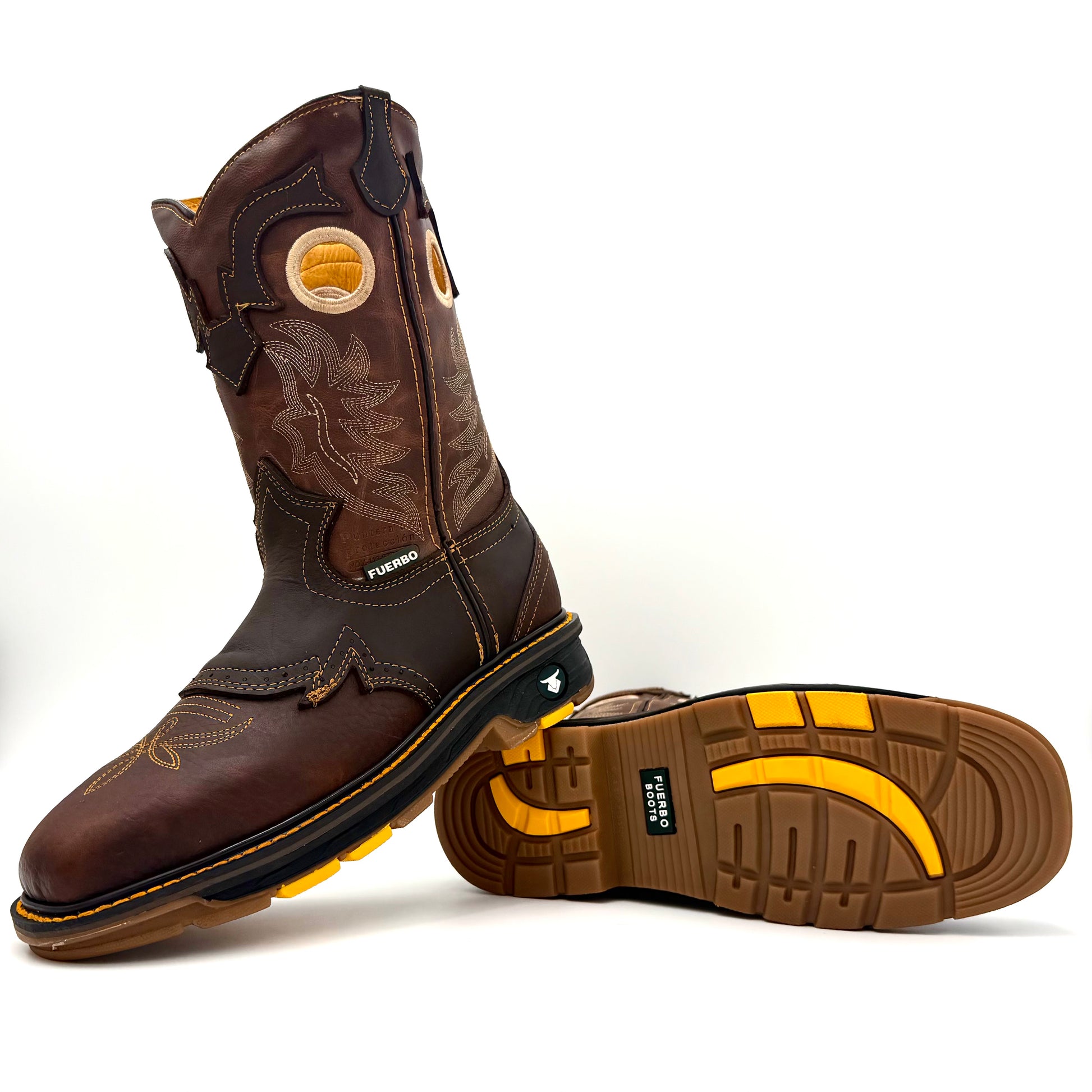 Brown leather Fuerbo rodeo work boots with western stitching, one upright and one laid flat to display the brown-and-yellow treaded outsole.